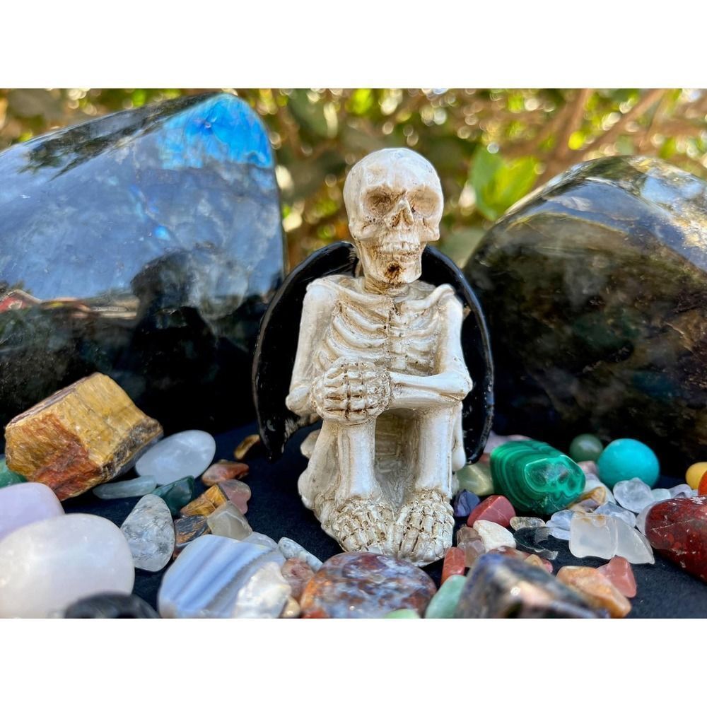Sitting Skeleton with Bat Wings Statue 3.85"